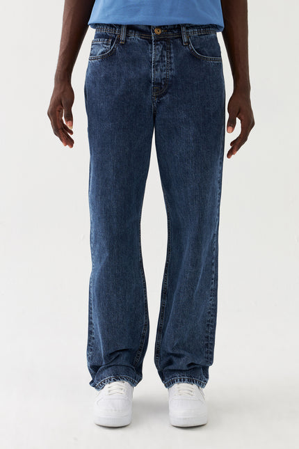 Jeans larghi in denim Sauvage Blau