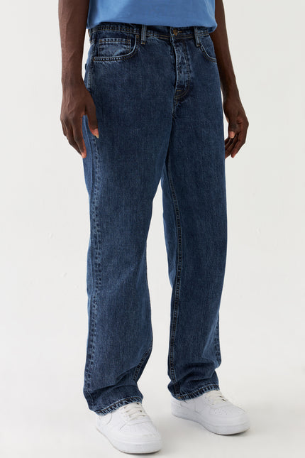 Jeans larghi in denim Sauvage Blau