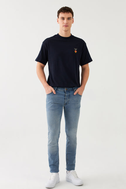 Jeans slim fit in denim Sauvage Blu